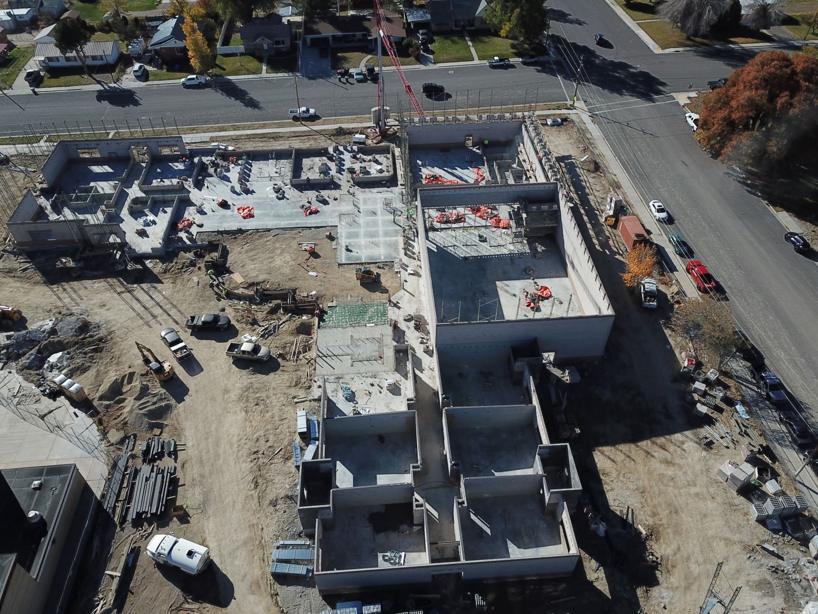 An aerial view of a construction site with a building under construction