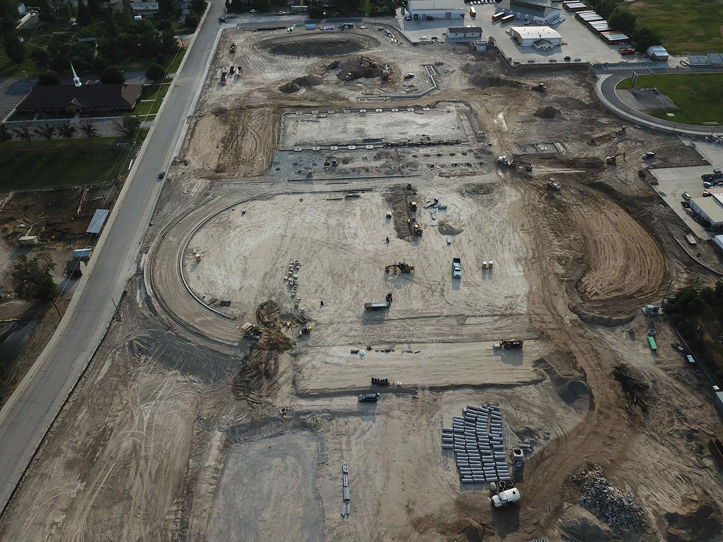An aerial view of a construction site with a lot of dirt