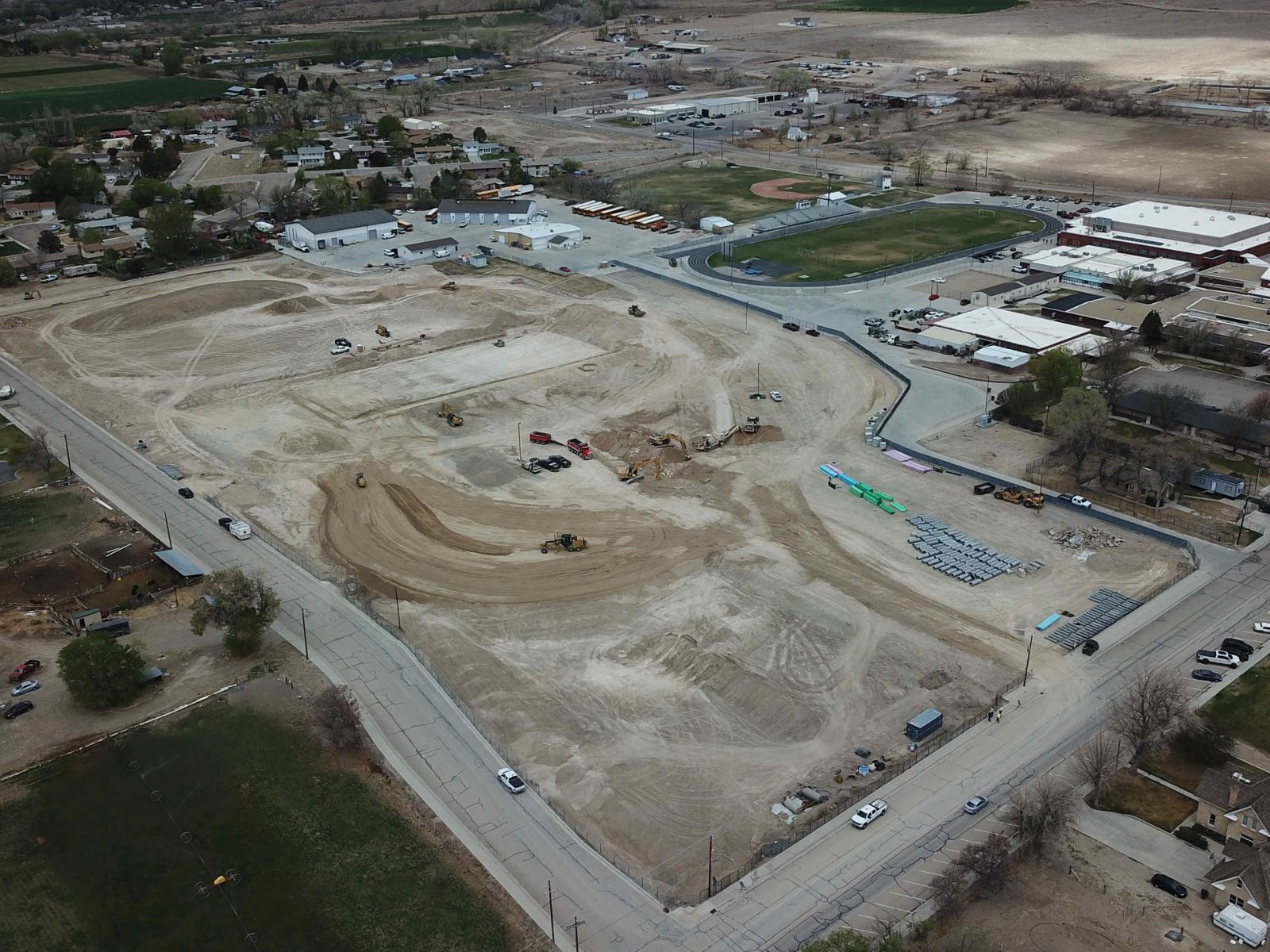 An aerial view of a construction site with a lot of dirt.