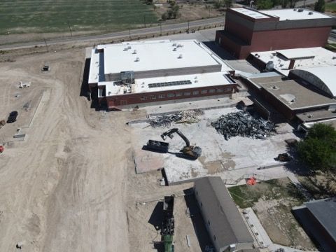 An aerial view of a large building under construction
