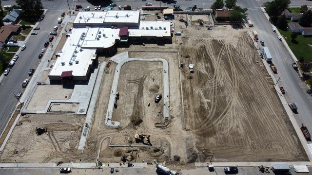 An aerial view of a large building under construction