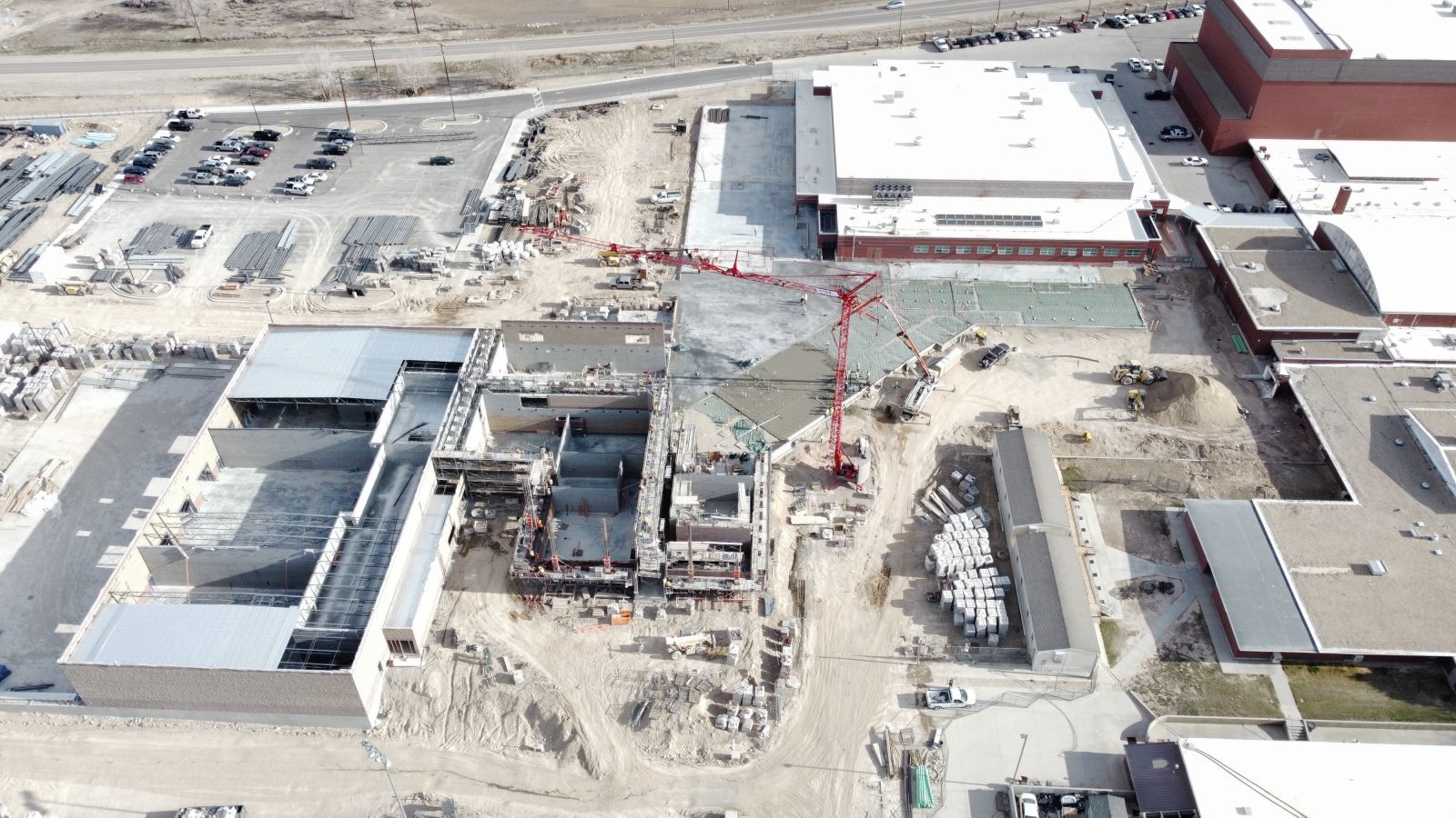 An aerial view of a large building under construction.
