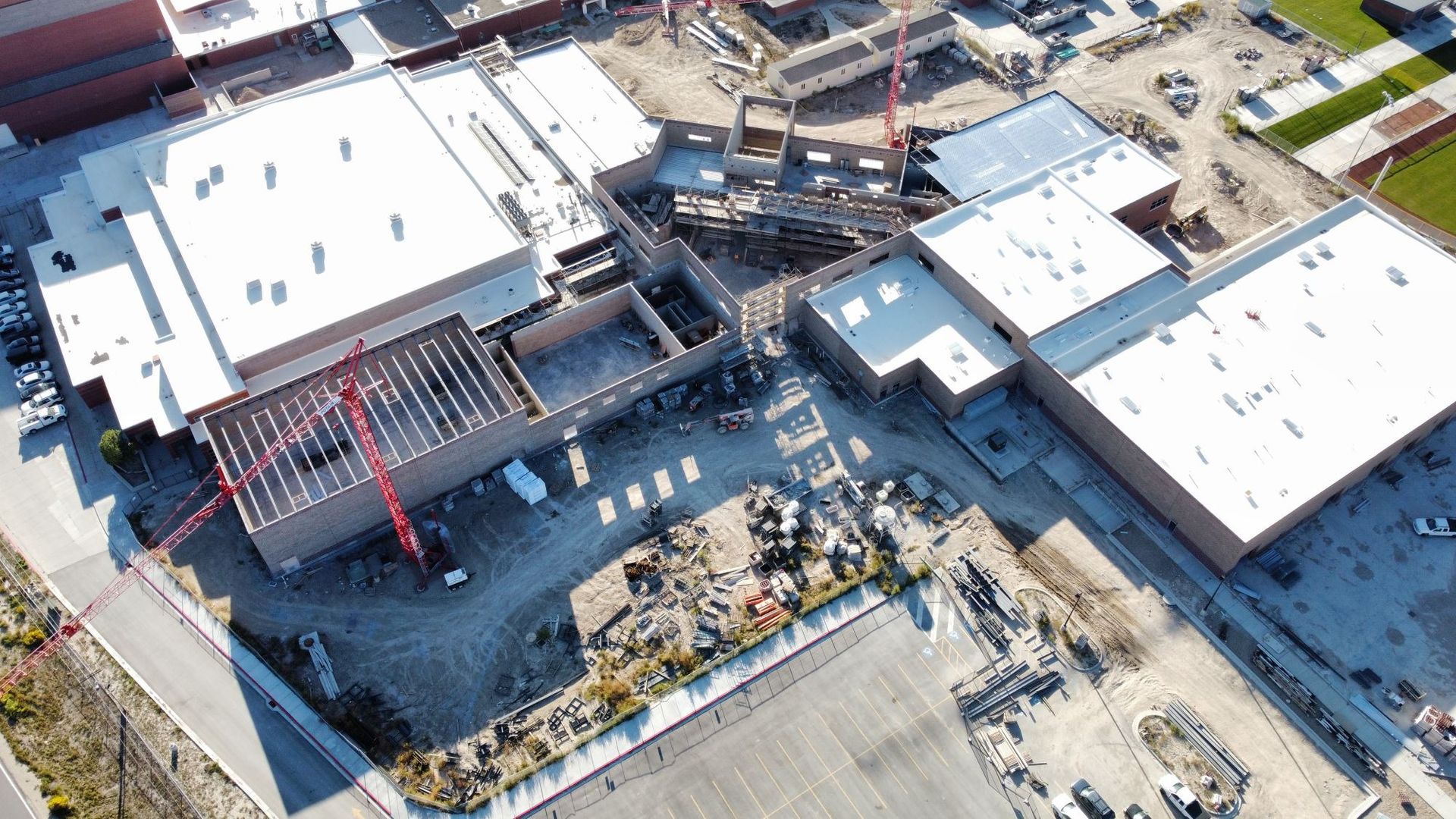 An aerial view of a large building under construction.
