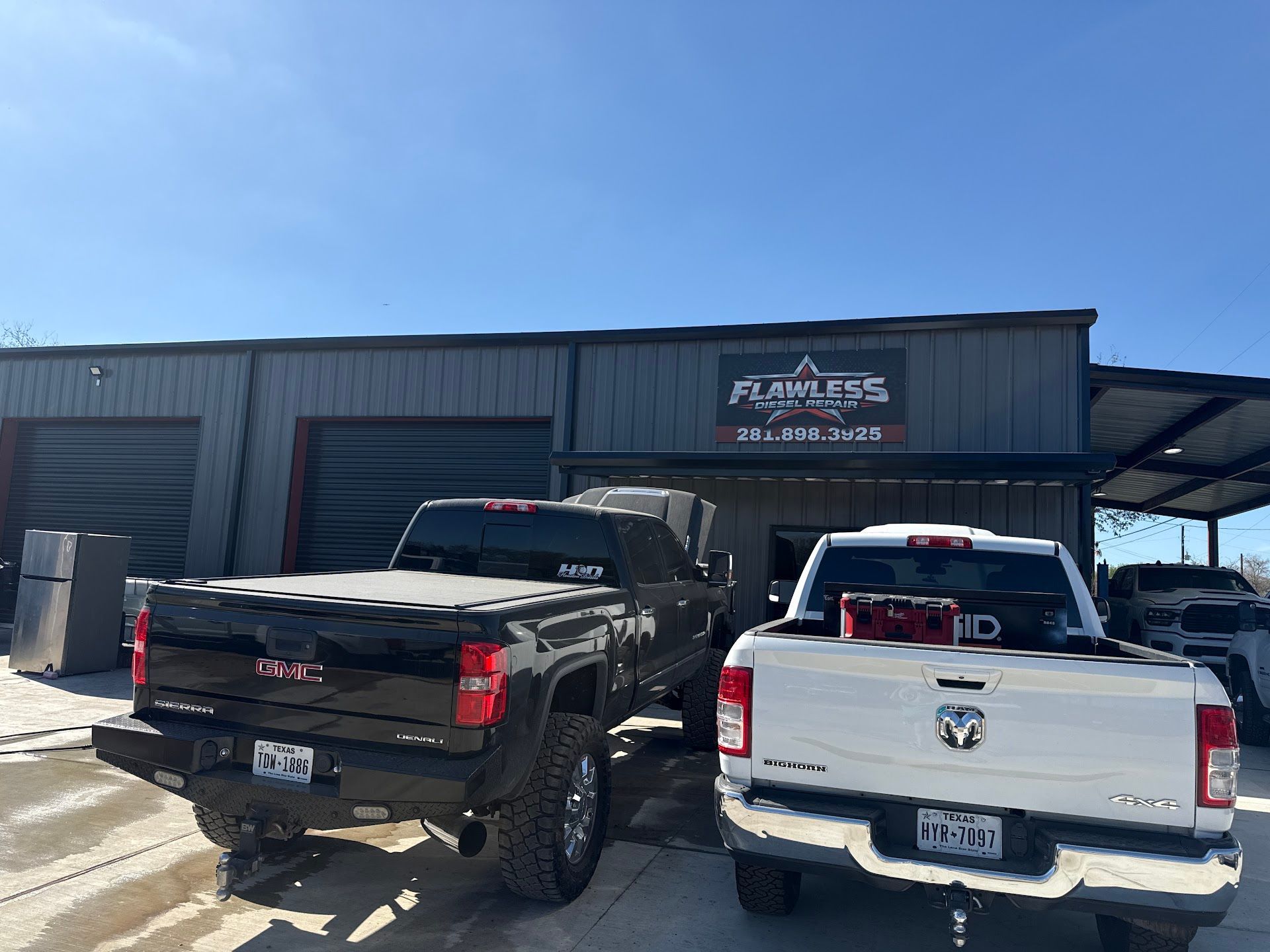 Diesel Trucks Parked Outside Repair Shop | Flawless Diesel Repair LLC