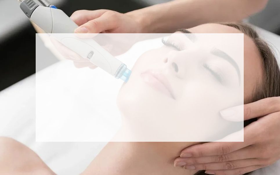 A woman is getting a facial treatment at a spa.