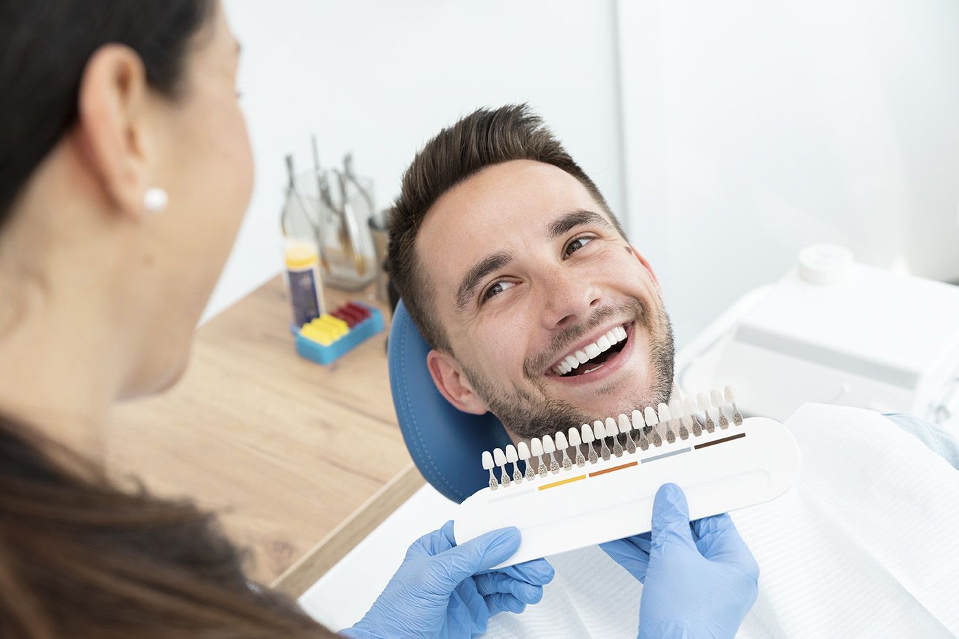 Professional teeth whitening treatment for a brighter whiter smile at dental clinic