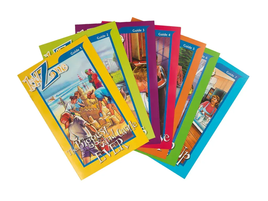 A bunch of colorful books are stacked on top of each other on a white background.