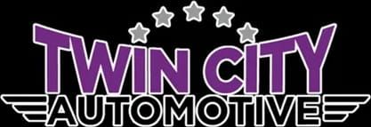 Twin City Automotive logo in purple and white with stars above the text on a black background
