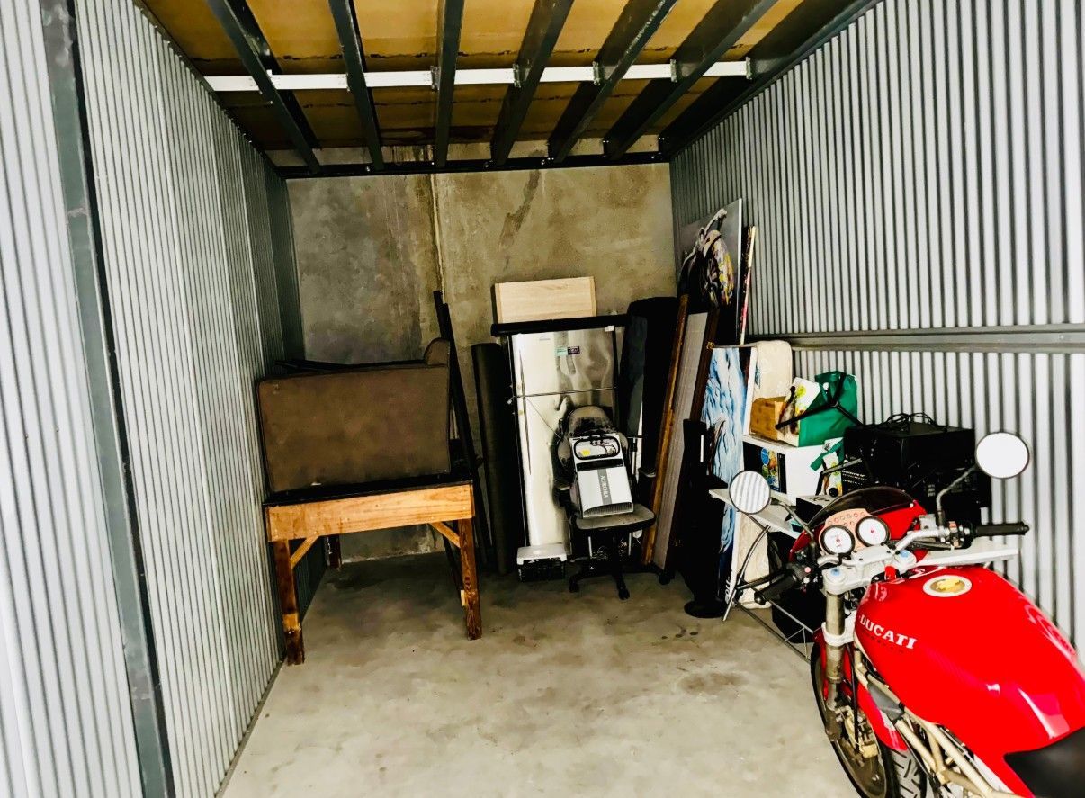 Removalists Townsville Furniture And Motorcycle On A Truck — Uplift Removals in Burdell, QLD