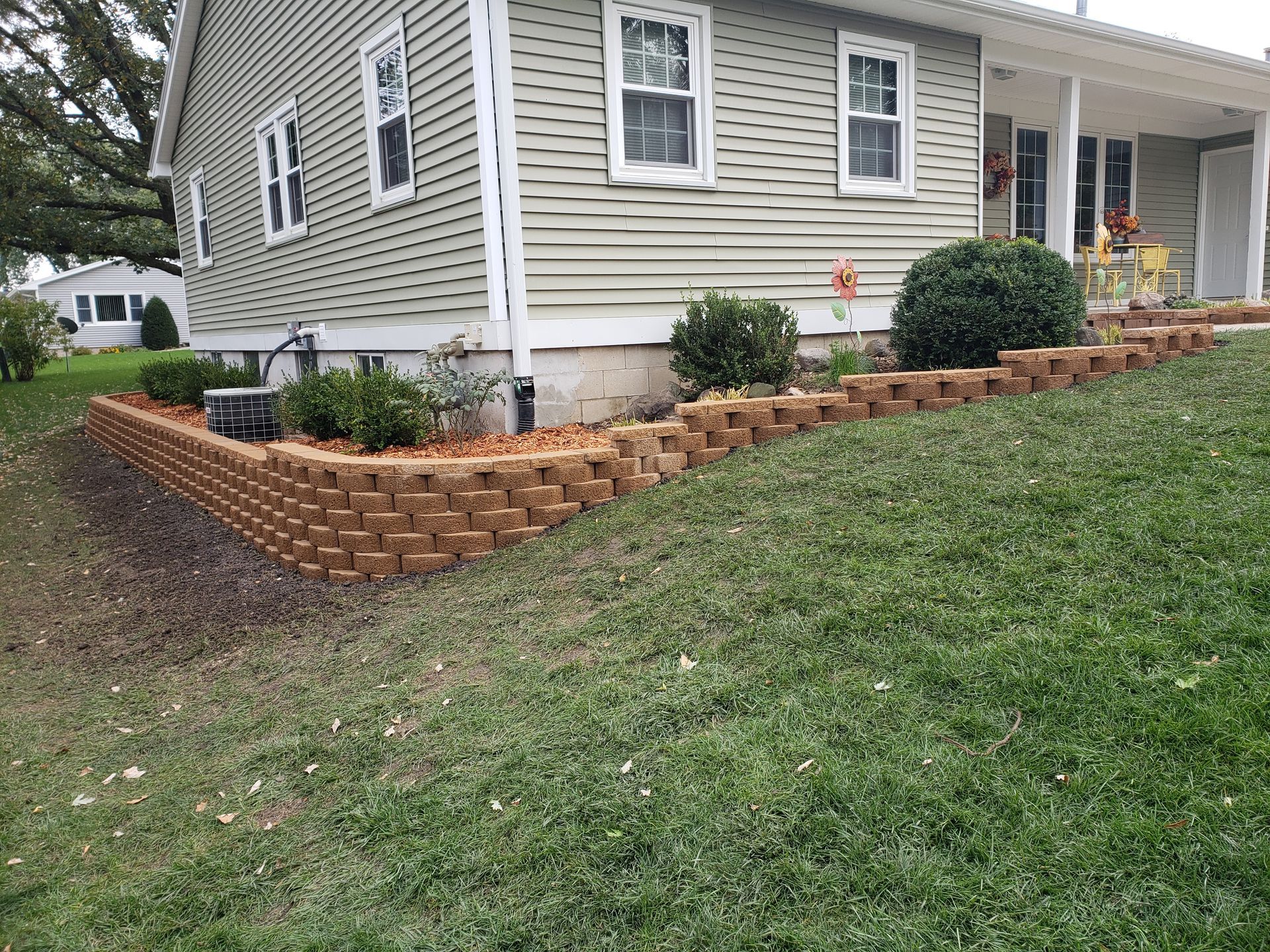 retaining wall flower bed around home