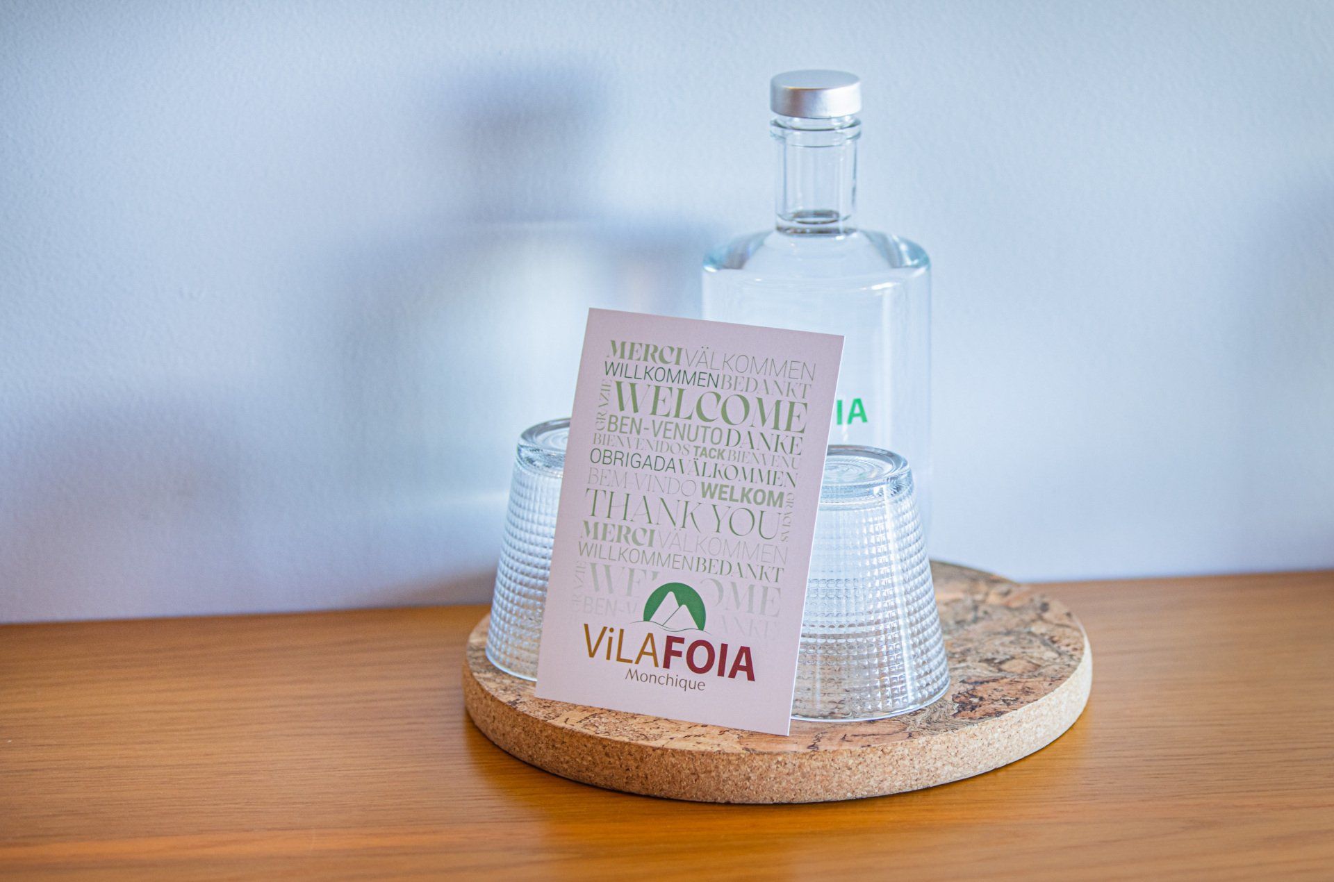 A welcome card and a bottle of water