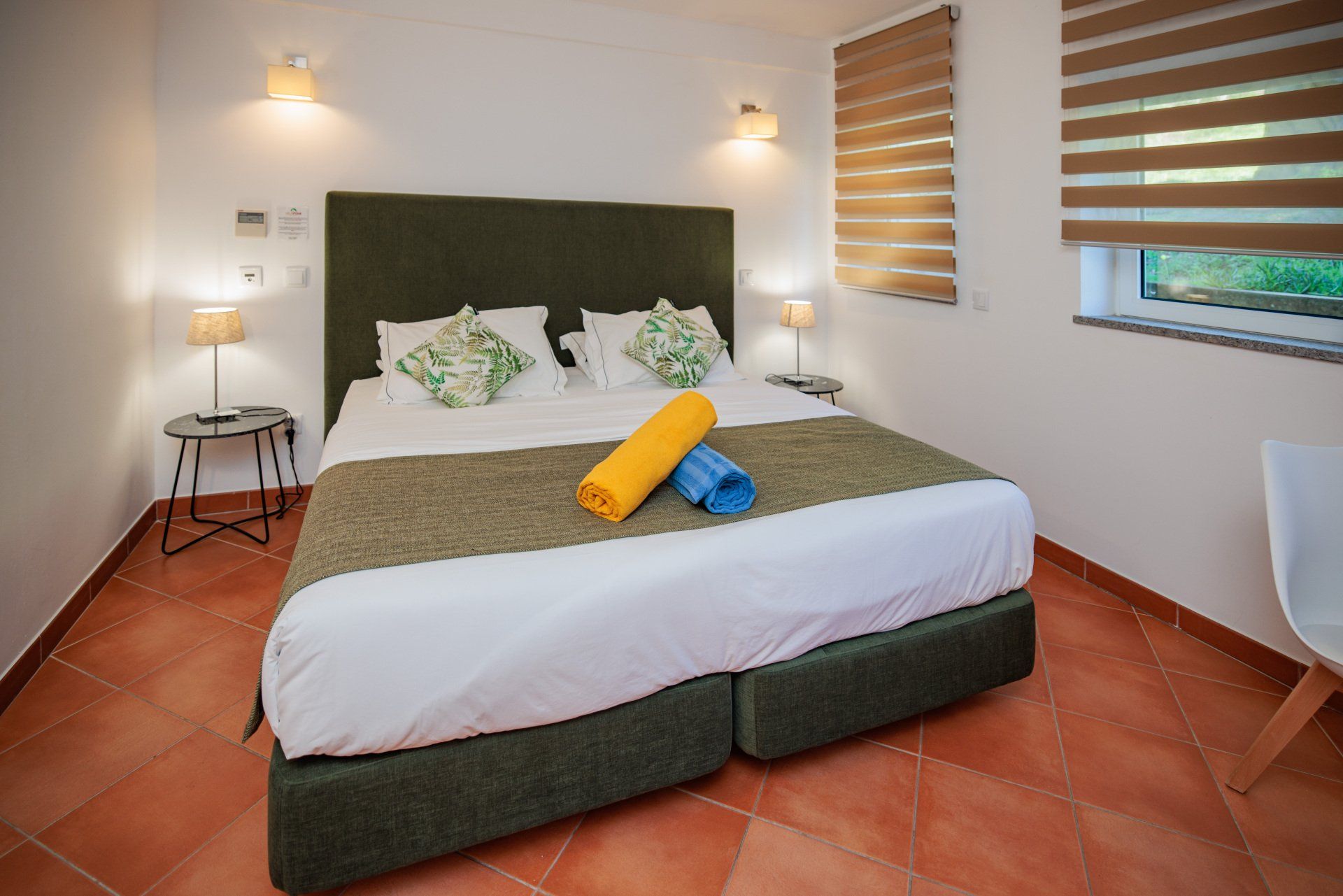 The bed in our economy double room