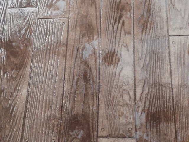 Weathered wooden planks with gray-brown grain and knots