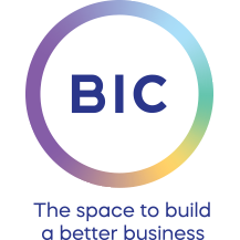 BIC logo in a gradient circle with text,