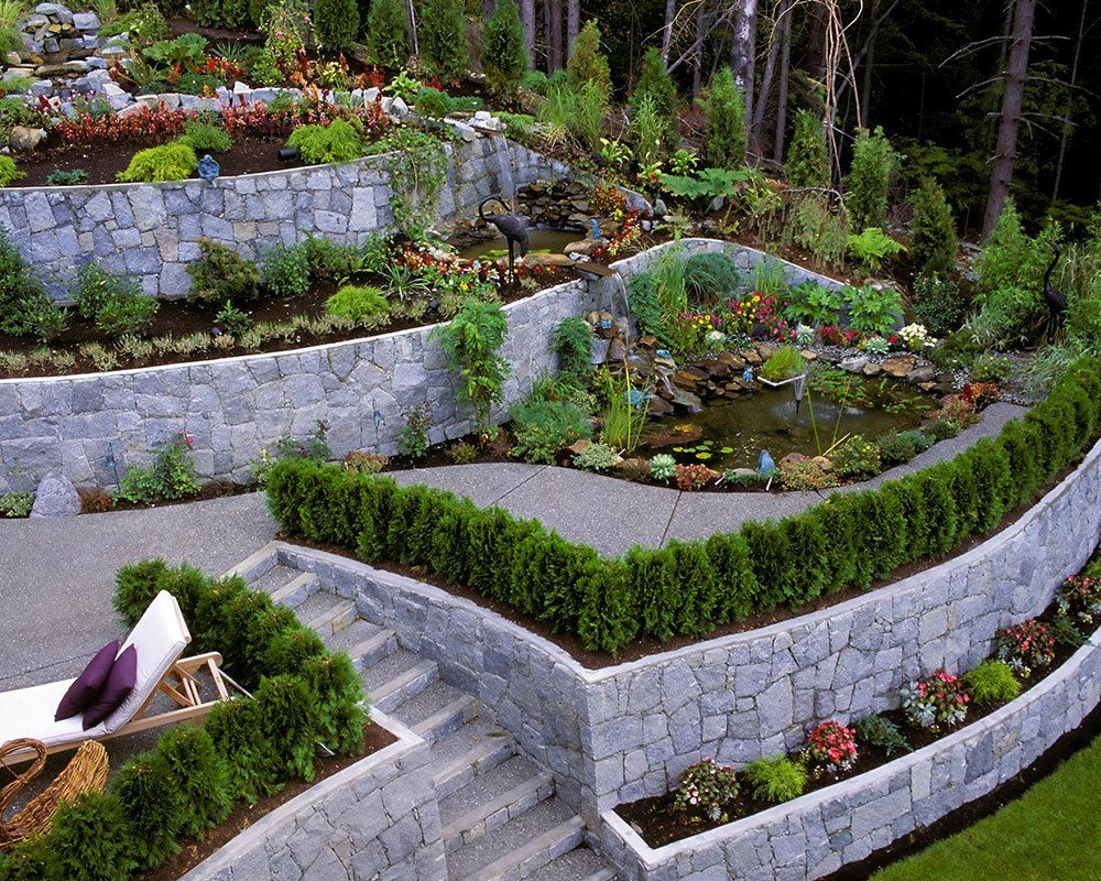 Landscaped Garden Retaining Wall — Miami, FL — Concrete Services Pump and Finishing Inc.