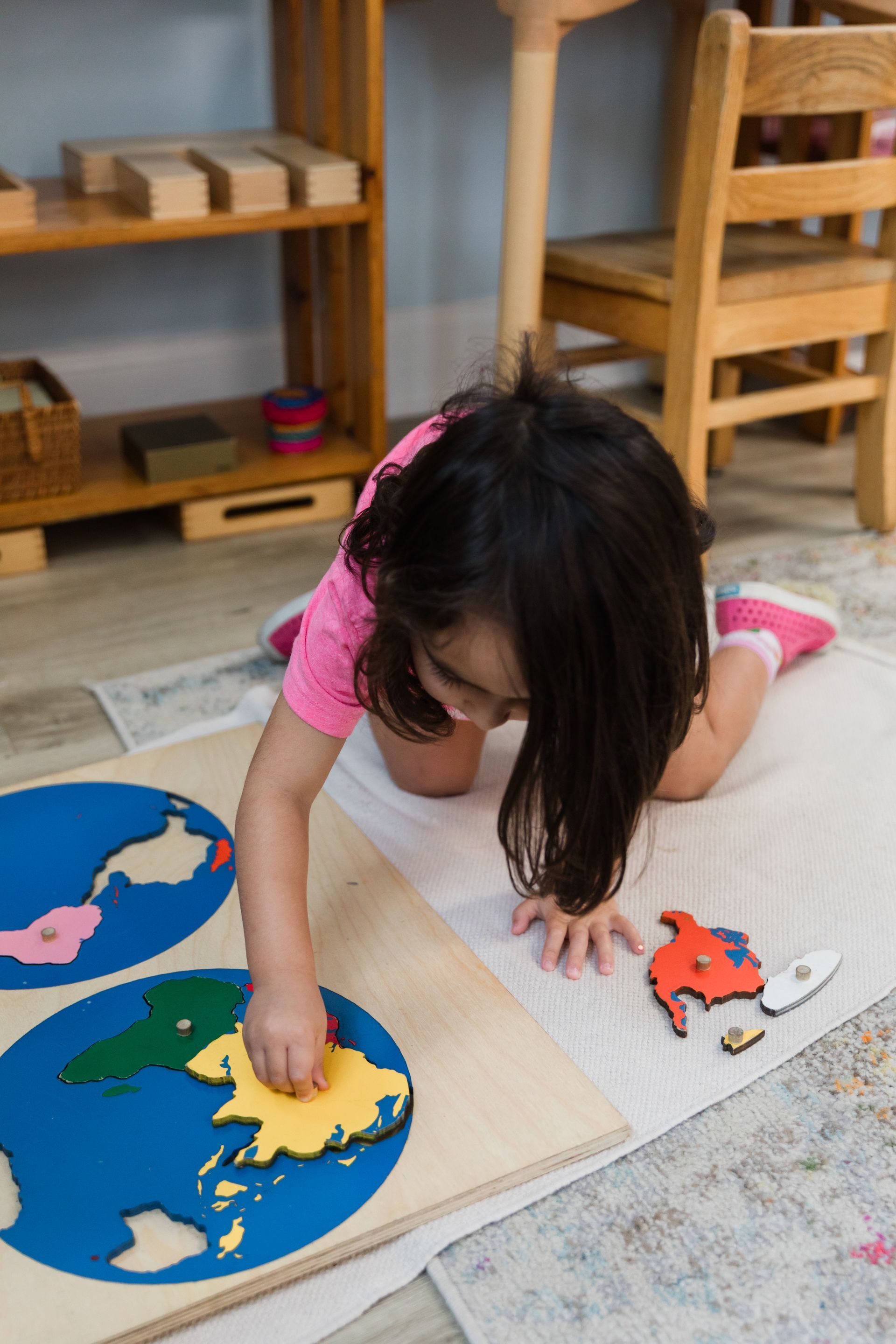 Montessori toddler working with sensorial activity