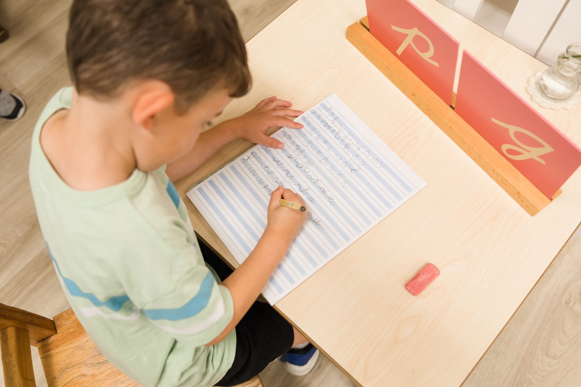 montessori child working with writing activity