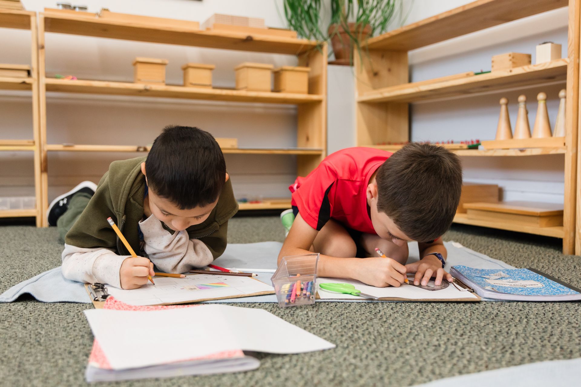 Montessori children working with writing activity