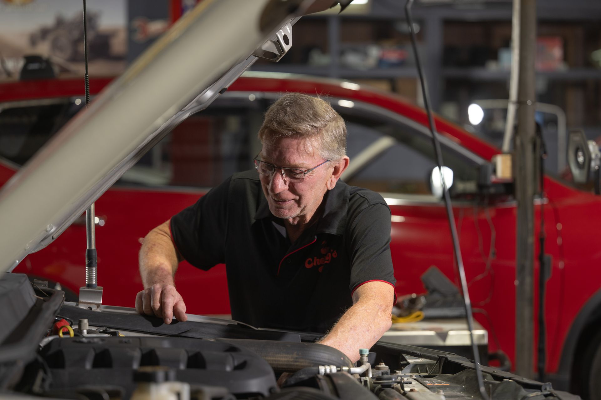 A mechanical from cherry's automotive reparing a vehicel