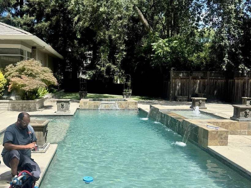 The same pool after Sunfish Pool Service cleared it, water clear and balanced