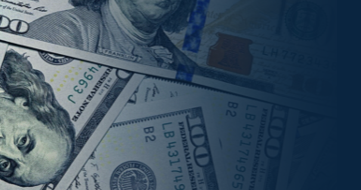 A pile of one hundred dollar bills with a dark blue gradient overlay on the right side.