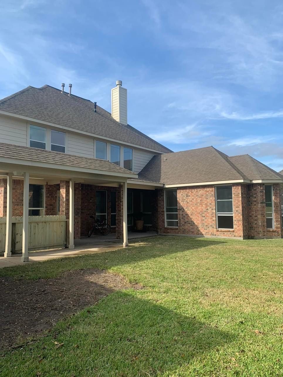 exterior cleaning a wooden deck