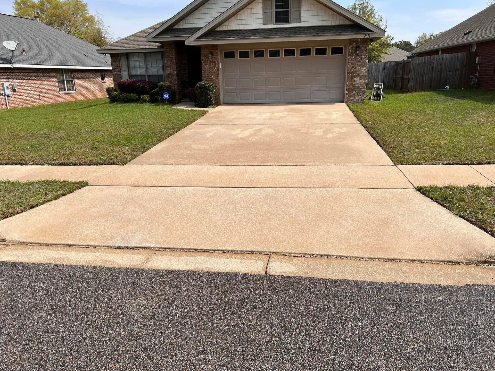 Power washing a house