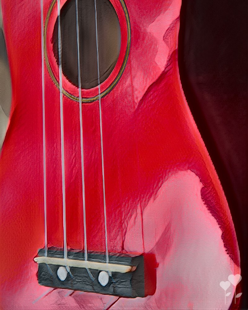 a close up of a red ukulele 