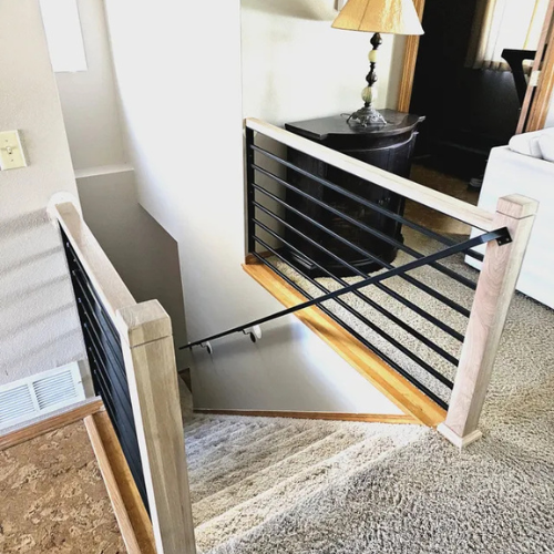 Custom fabricated horizontal handrail with white oak built and installed by 83MetalCraft, LLC in Boise Idaho