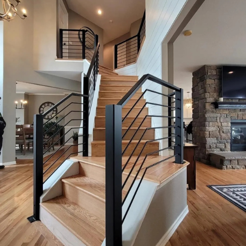 Black horizontal steel railing fabricated and installed by 83MetalCraft LLC