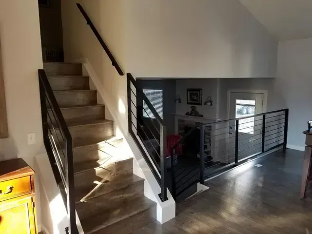 Black Horizontal interior metal railing by 83MetalCraft, LLC