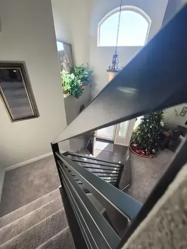 Black Interior Horizontal railing fabricated and installed by 83MetalCraft LLC in Boise Idaho