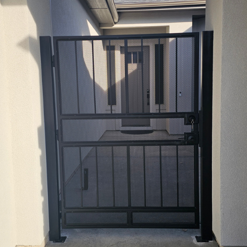 Custom fabricated security courtyard entry gate for a home in Kuna Idaho by 83MetalCraft.