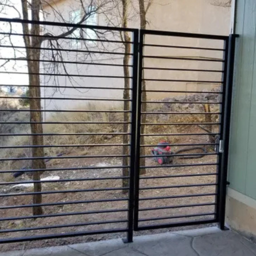  Custom steel side yard gate designed to fit an existing residential fence fabricated by 83MetalCraft.