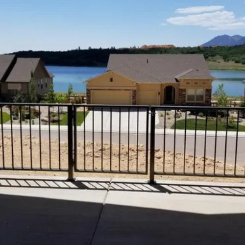 Vertical picket railing and entry gate by 83MetalCraft LLC in Boise