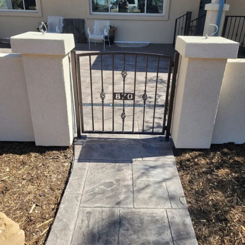 Custom fabricated ornamental iron courtyard gate by 83MetalCraft in Boise.