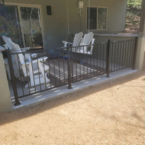 Finished custom metal gate and matching fence at a Treasure Valley home fabricated by 83MetalCraft.