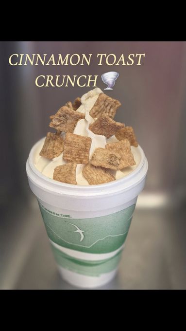 Cinnamon Toast Crunch cereal in a green cup topped with ice cream against a dark background