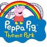 Peppa Pig standing in front of a rainbow and roller coaster logo, 