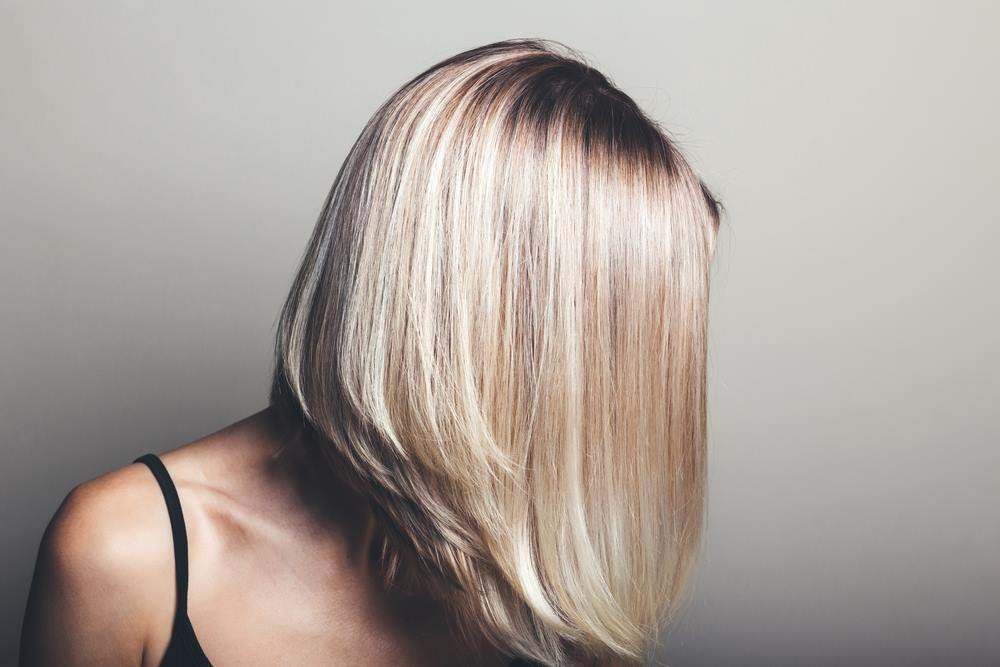 Blonde Bob Haircut with Dark Roots, Head Tilted Down — Fraser Shores Hair Design In Urraween, QLD