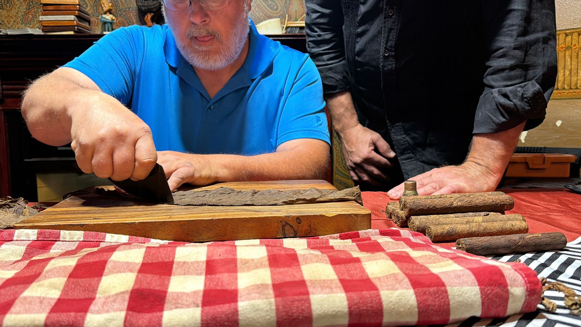 Corey Frisbee teaches Doug how to Roll Cigars