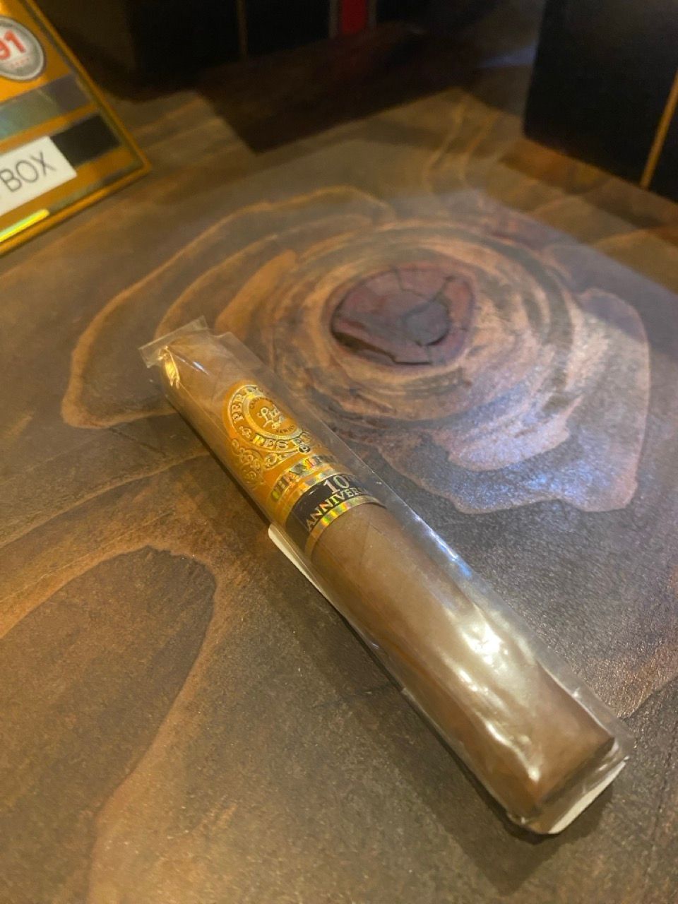 A cigar laying on a table