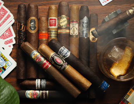 A store front with a sign that says cigars on it