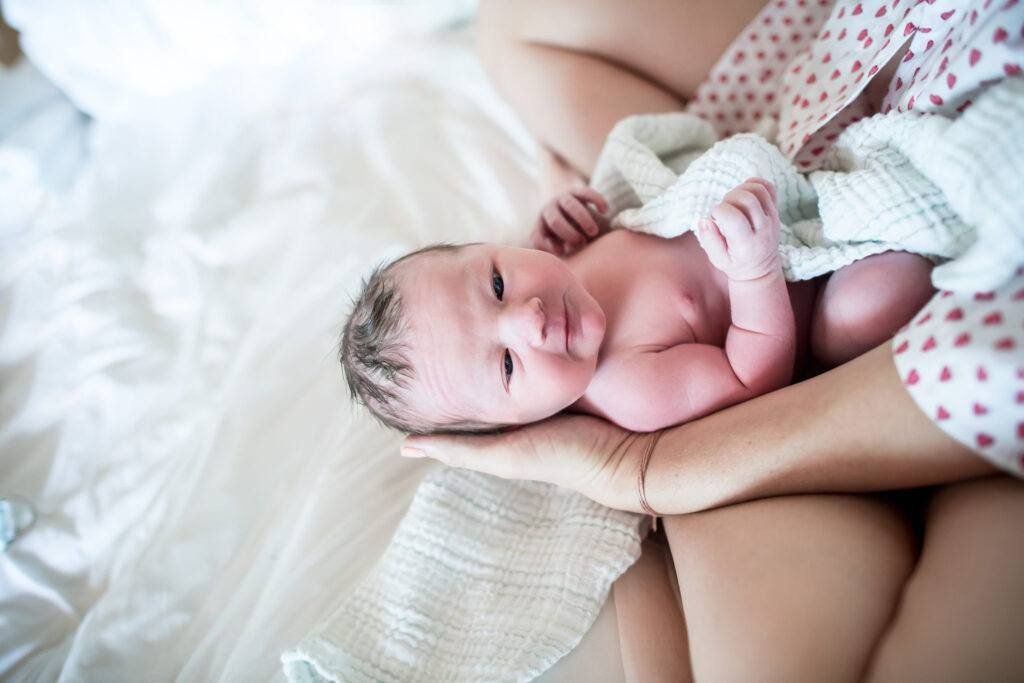 Baby in moms arms