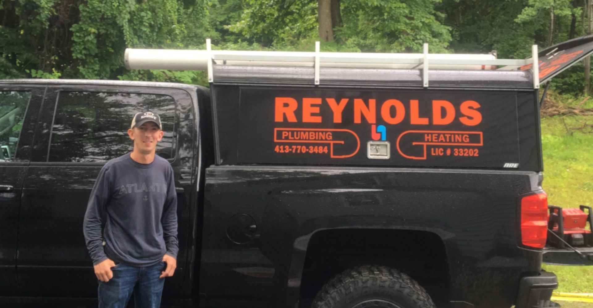 Man Fixing Something | North Adams, MA | Reynolds Plumbing & Heating Man Fixing Something | North Adams, MA | Reynolds Plumbing & Heating