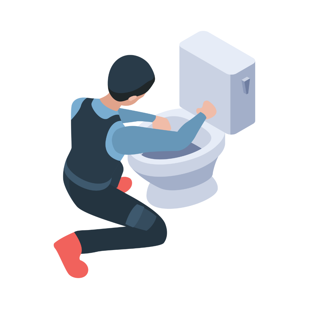 A plumber is kneeling down to fix a toilet.