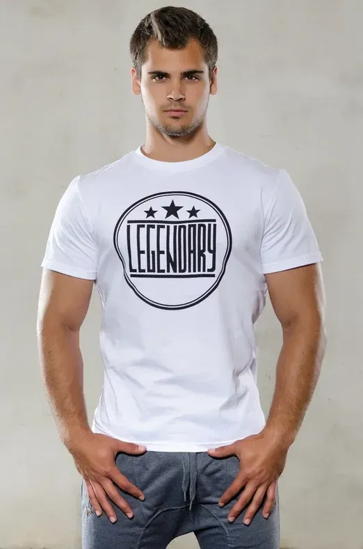 A Man is Wearing a White T-shirt That Says Legendary โ Bigfoot Customs In Taree, NSW