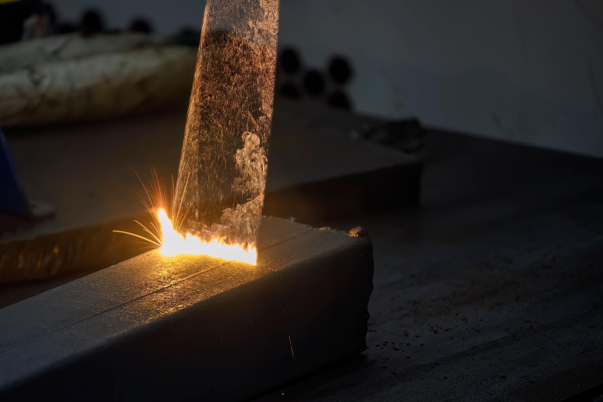 A Person is Removing Rust From a Piece of Metal With a Laser โ Bigfoot Customs In Taree, NSW