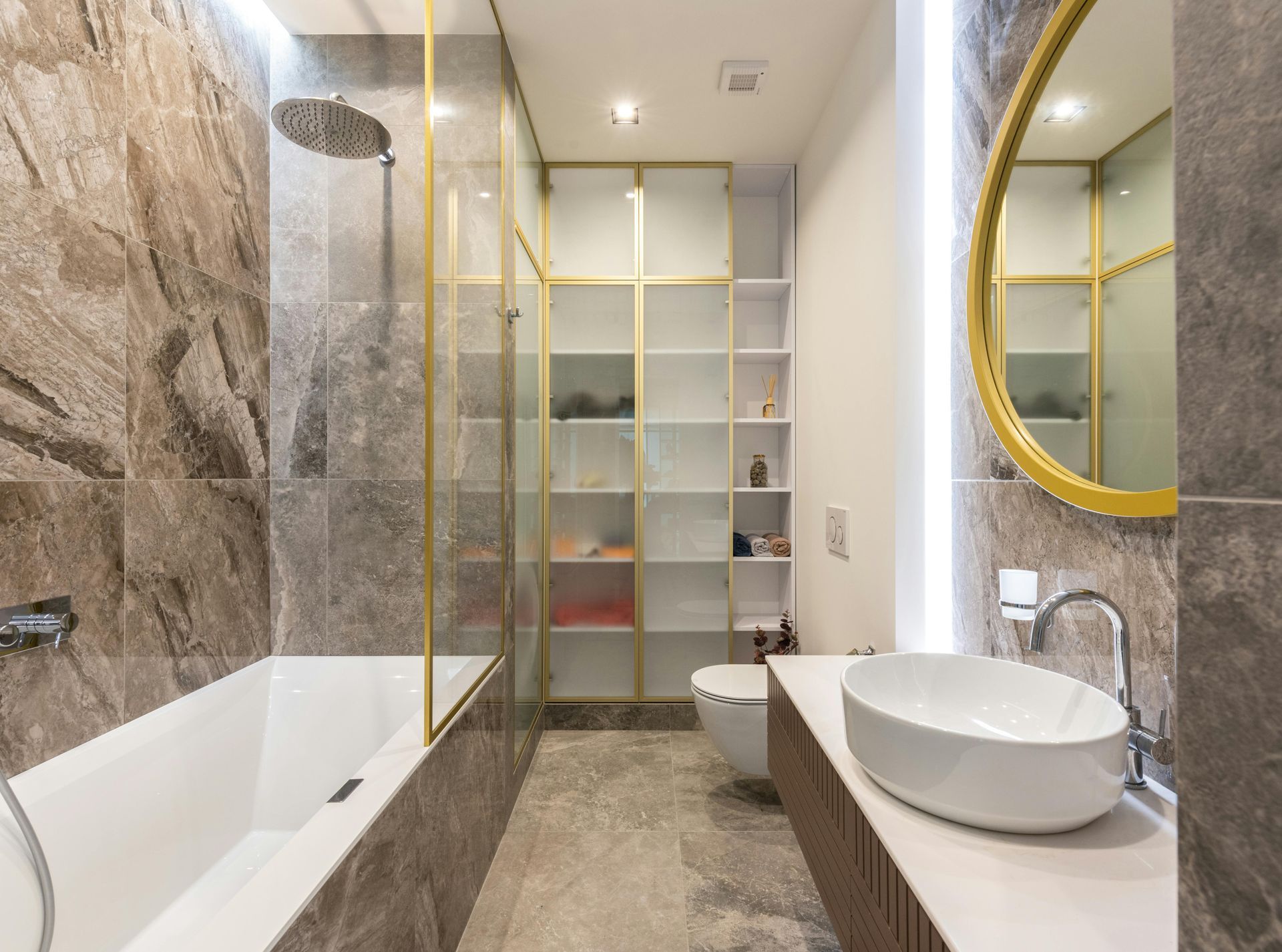 Luxury Bathroom with Gold Accents and Marble Tiles