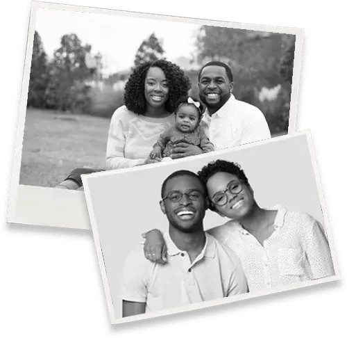 A black and white photo of a family with two children.